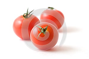 Three Tomatoes on White