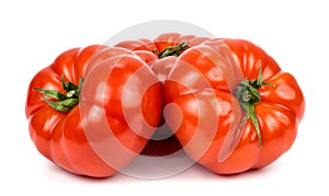 Three tomatoes on white