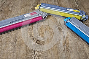 Three toner cartridges for color laser printers