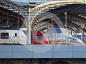 Three trains standing at a German railway station