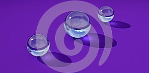 Three transparent glass balls on a blue background. 3d illustration