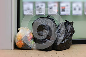 Three Trash Bags, Garbage bag black placed front convenience store, Bin, Trash, trash bag, trash on sidewalk, Three bags bin of ga