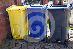 Three trash bins for separate waste