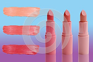 Three tubes of lipstick and abstract strokes, stains of different tones, sample color matching makeup, the concept of natural