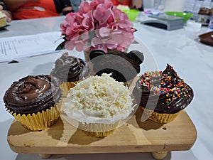 Three types of cup cake are displayed, namely cheese cup cake, chocolate cup cake and oreo cup cake