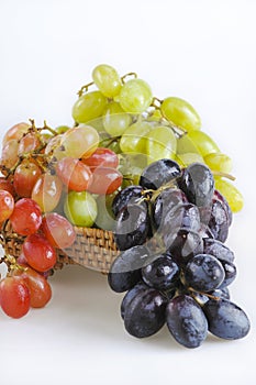 Three types red, green and black of grapes