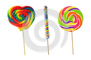 Three unique colorful lollipops isolated on white