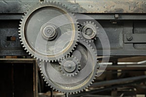 Three used gearwheels with different sizes