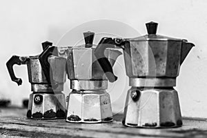 Three used moka coffee pots stash in Italy.