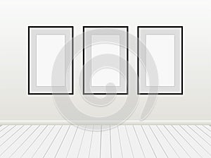 Three Vector Empty Blank White Mock Up Posters Pictures Black Frames on a Wall.