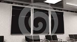 Three vertical billboards on underground wall Mockup. Hoardings advertising triptych on train station interior 3D rendering