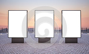 three vertical outdoor billboards