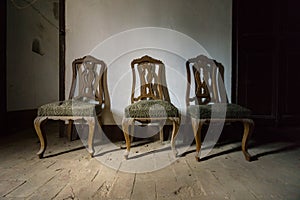 Three vintage chairs photo