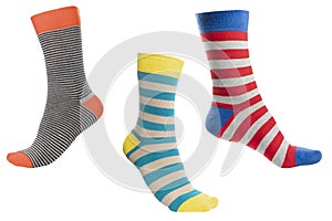 Three volumetric sock with different lines isolated on white background. Colorful volumetric socks son white background. Colored