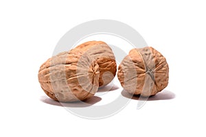 Three walnuts with shadow