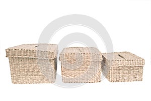 Three wattled baskets isolated on white background