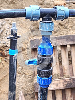 Three way joint of the PVC pipe. Potable water delivery system