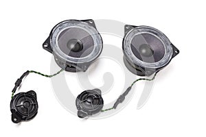 Three-way speaker system, coaxial speaker, car audio music, subwoofer and tweeter on white isolated background. Top view