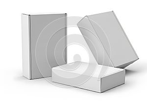 Three white blank rectangular cardboard packaging boxes mock up