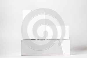 Three white boxes on a white background.