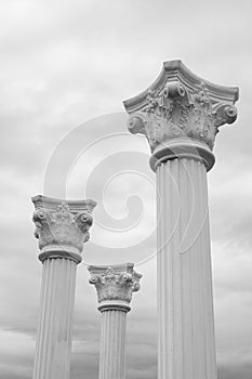 Three white columns