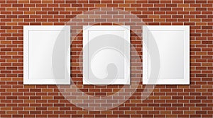 Three white frames on a brick wall. Vector picture frames layout