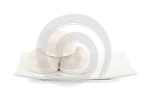 Three White Mochi on White Plate