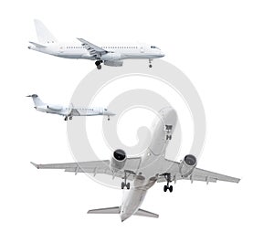 three white passenger planes has released its landing gear and is landing isolated on white background with cliping path