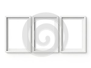 Three white picture frames isolated on white background