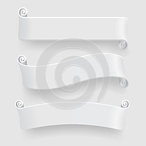 Three white ribbons with drop shadow on white background