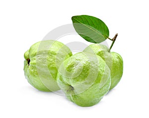 Three whole guava fruit with green leaf isolated on white