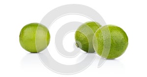 Three whole limes isolated on a white background