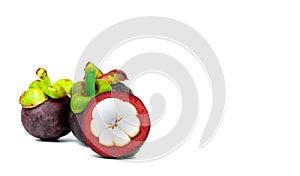 Three whole purple mangosteen and another cross section isolated on white background. Tropical fruit from Thailand.Queen of fruit