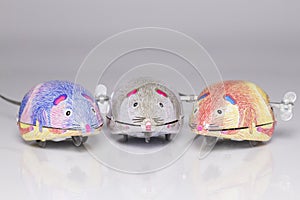 three wind-up toy mice