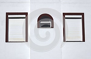 Three windows on a wall