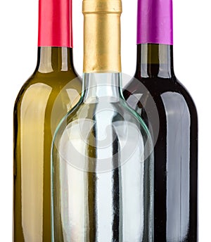 Three wine bottles isolated on white background