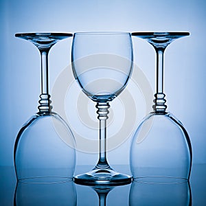 Three wineglasses in a row