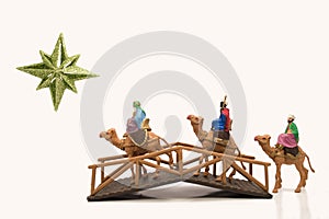 Three wisemen crossing a bridge