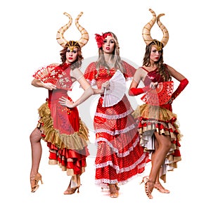 Three women dancers with horns. Isolated on white background.