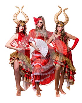 Three women dancers with horns. Isolated on white background.