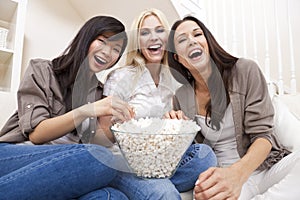 Three Women Friends Eating Popcorn at Home