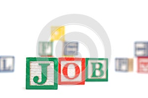 Three wooden alphabet blocks on white background