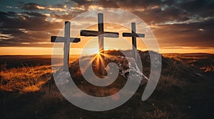 three wooden chrsitian crucifix crosses on hill at sunset