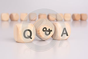 text 'q and a' - Question and Answer - on wooden blocks photo