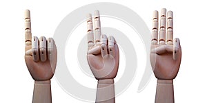 Three wooden hands, with one, two and three fingers raised respectively