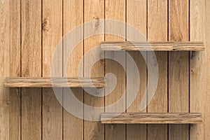 Three wooden shelves on wall