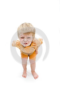 Three year old boy with unhappy expression