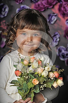 Girl with a bouquet of roses