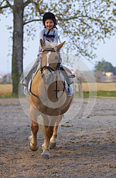 Three Years old Child ride to Pony