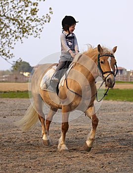 Three Years old Child ride to Pony